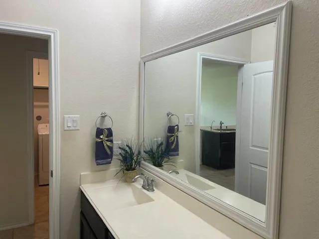 a front view of a house with yard