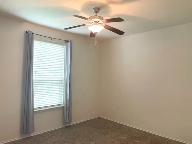 a kitchen with a stove and a microwave