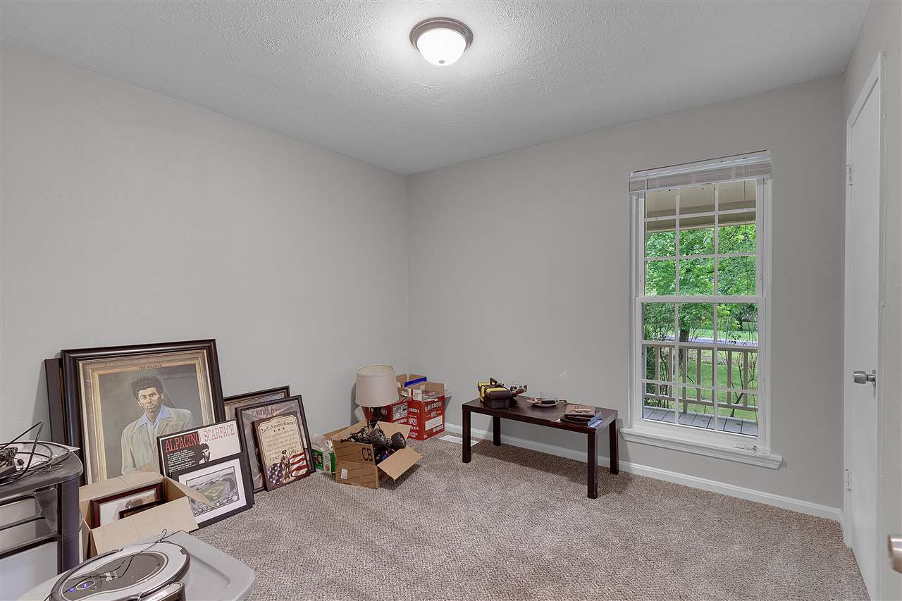 58 John Brown Road Beech Bluff, TN 38313 - Photo 12 of 18 a living room with furniture and a window