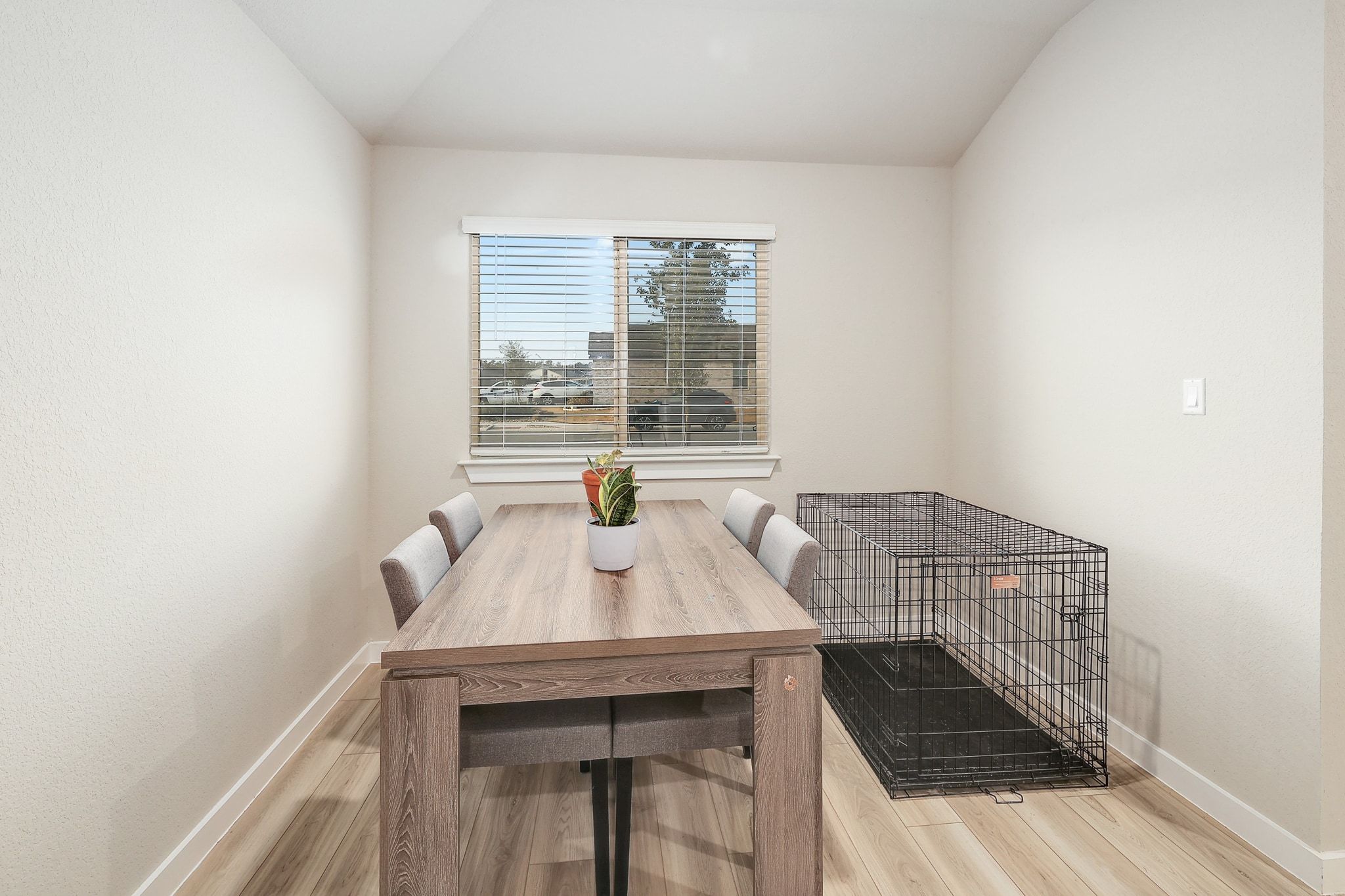 204 Halford Road Georgetown, TX 78633 - Photo 10 of 27 Dining space featuring light wood-style floors and lofted ceiling