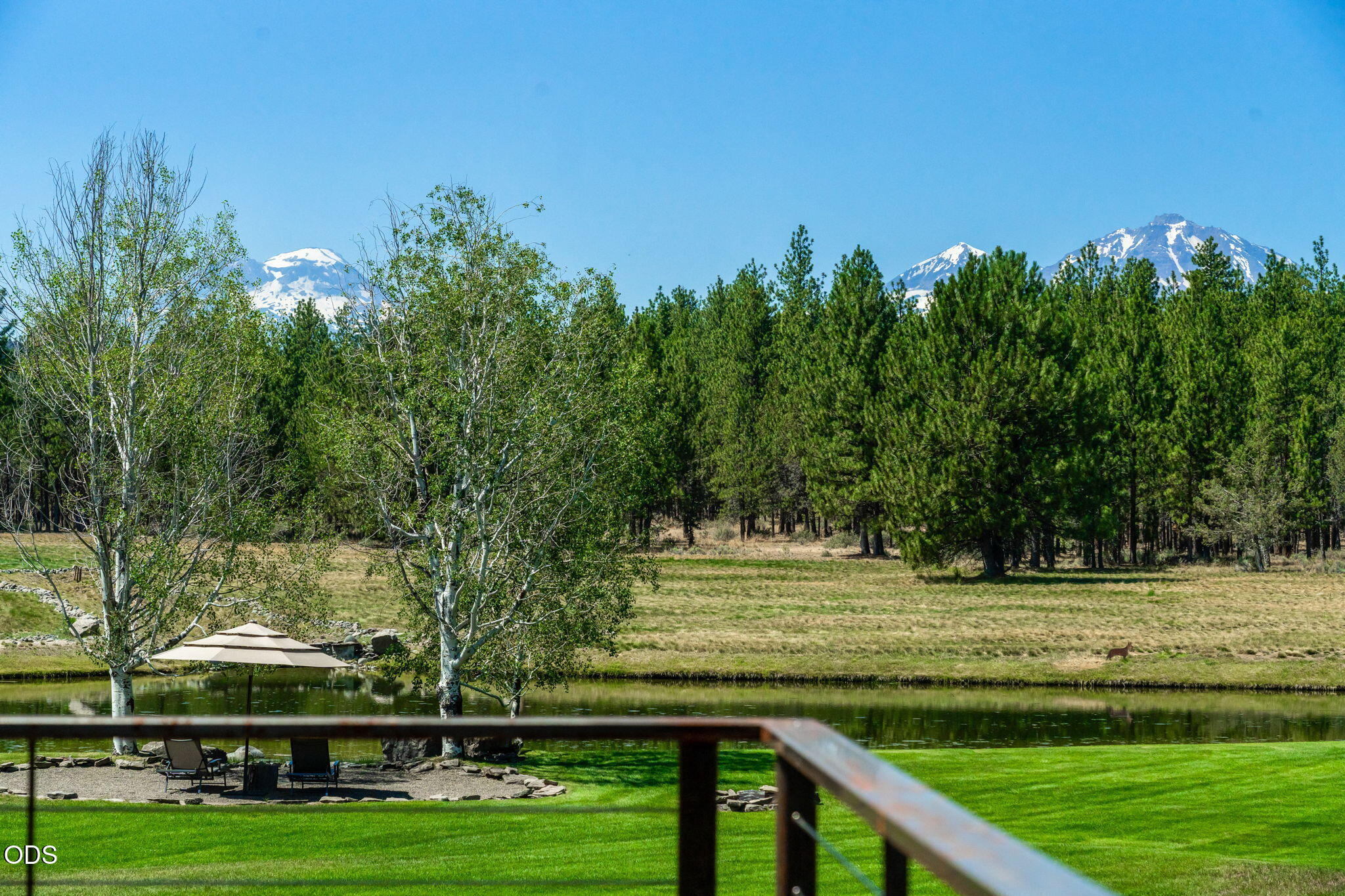 67376 Peterson Mill Road Sisters, OR 97759 - Photo 64 of 72 a view of a golf course with a park