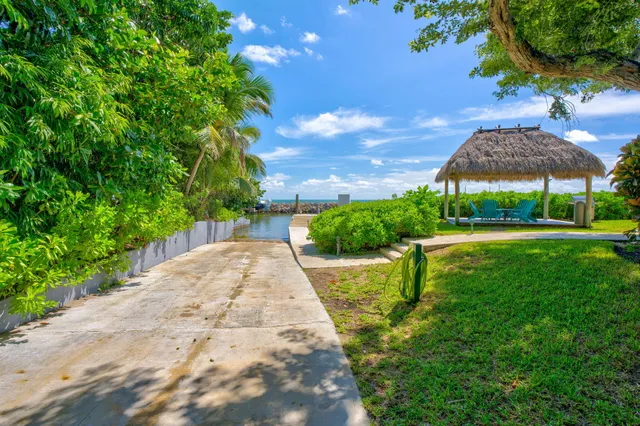 a view of a house with porch and wooden floor