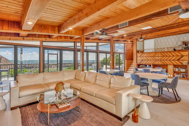 a dining room with furniture and outdoor view