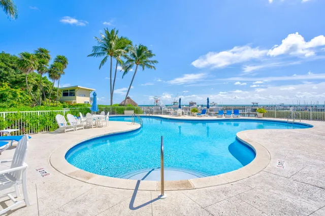 a view of a garden with a building