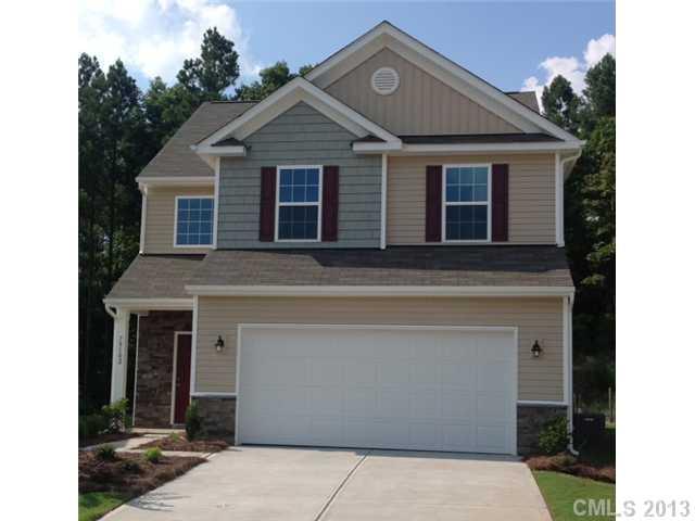 78102 Rillstone Drive, Unit 203 Lancaster, SC 29720 - Photo 1 of 9 a front view of a house with yard