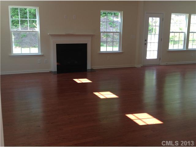 78102 Rillstone Drive, Unit 203 Lancaster, SC 29720 - Photo 4 of 9 a view of an empty room with a window
