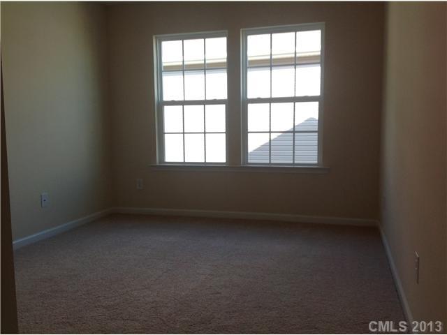 78102 Rillstone Drive, Unit 203 Lancaster, SC 29720 - Photo 7 of 9 an empty room with a window