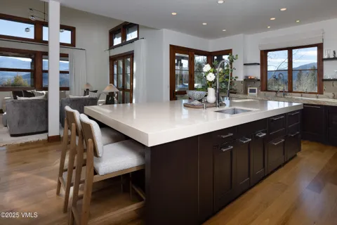 a view of balcony with couch and chairs