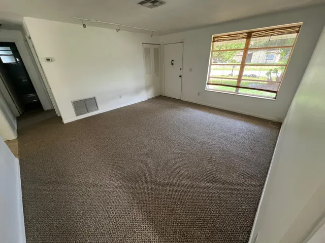 an empty room with a window