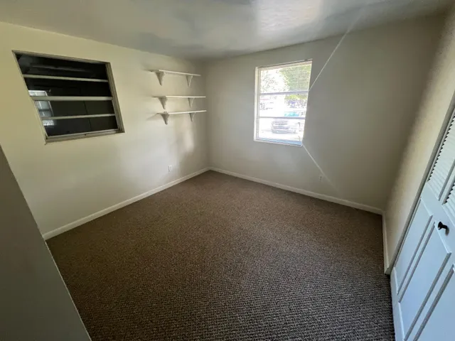 an empty room with windows