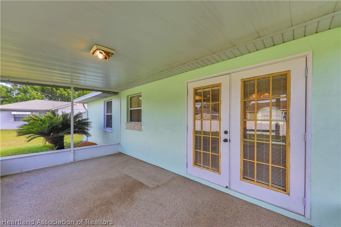 4441 Leaf Road Sebring, FL 33875 - Photo 16 of 21 a view of an empty room with a window