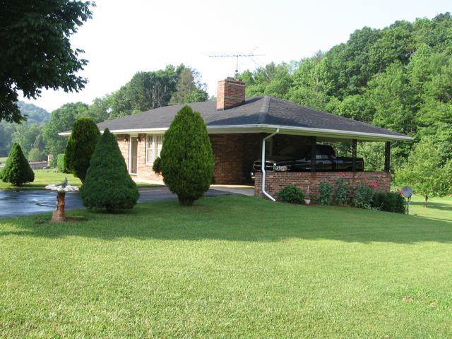 3601 Conner Grove Road Southwest Willis, VA 24380 - Photo 2 of 10 front view of a house with a yard