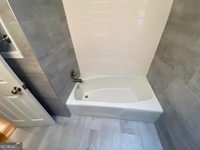 a bathroom with a bathtub