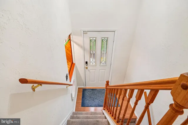 a view of entryway with wooden floor