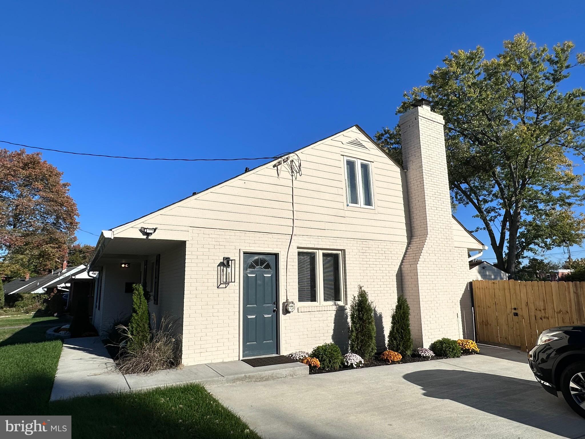 1107 Navahoe Drive Silver Spring, MD 20903 - Photo 24 of 26 a front view of a house with a yard