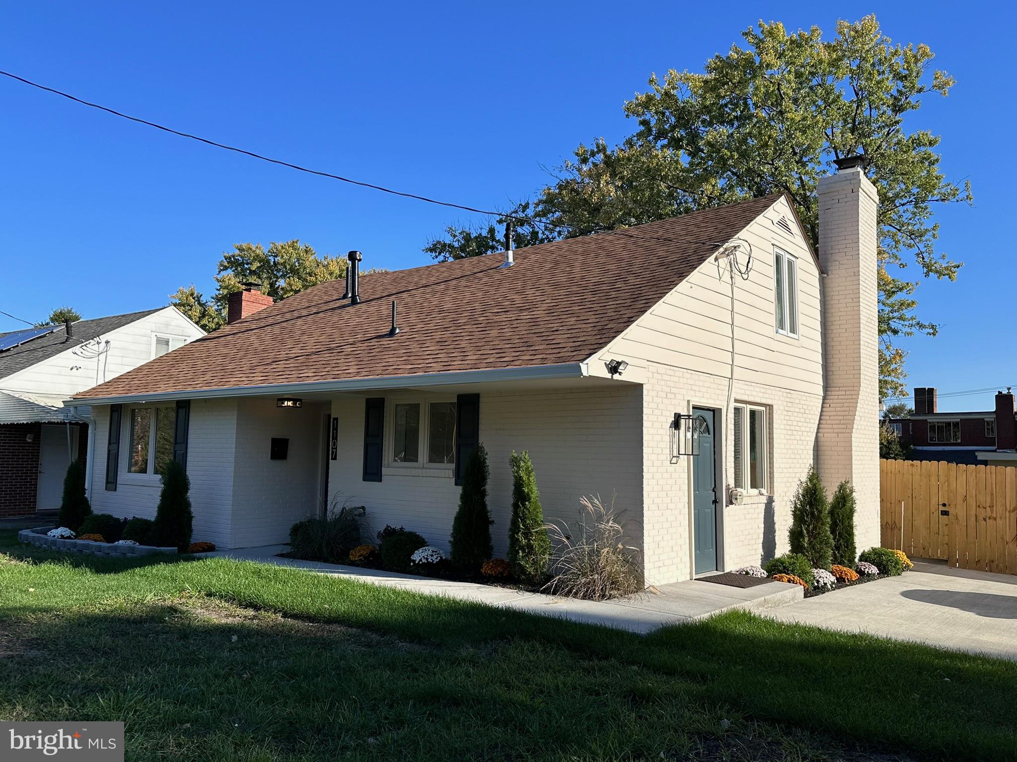1107 Navahoe Drive Silver Spring, MD 20903 - Photo 26 of 26 a front view of a house with a yard