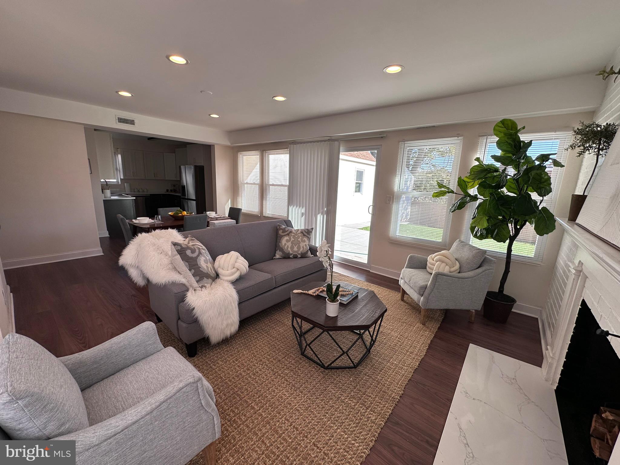 1107 Navahoe Drive Silver Spring, MD 20903 - Photo 4 of 26 a living room with furniture and a large window