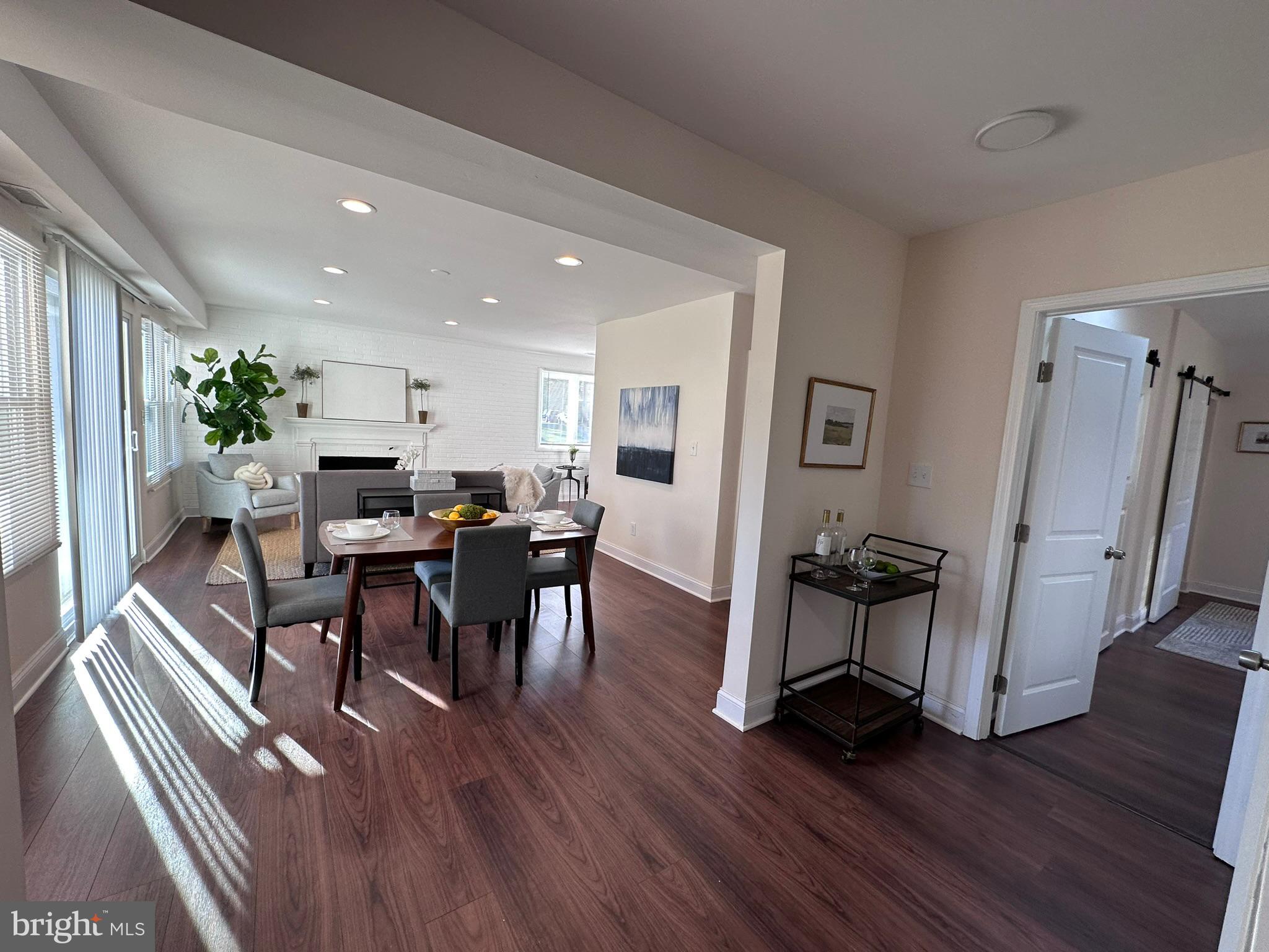 1107 Navahoe Drive Silver Spring, MD 20903 - Photo 6 of 26 a view of a dining room with furniture window and wooden floor