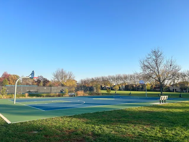 a view of street with houses and trees