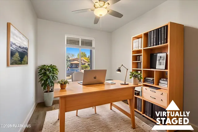 a workspace with furniture and window