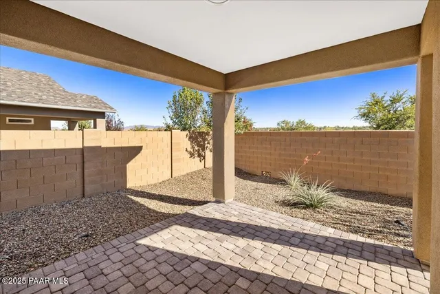 a view of a terrace with a ocean