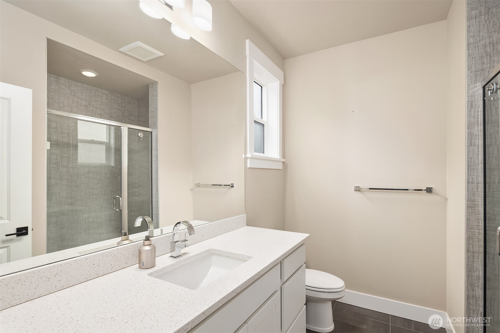 1435 242nd Place Southeast Bothell, WA 98021 - Photo 23 of 40 a bathroom with a sink toilet and shower