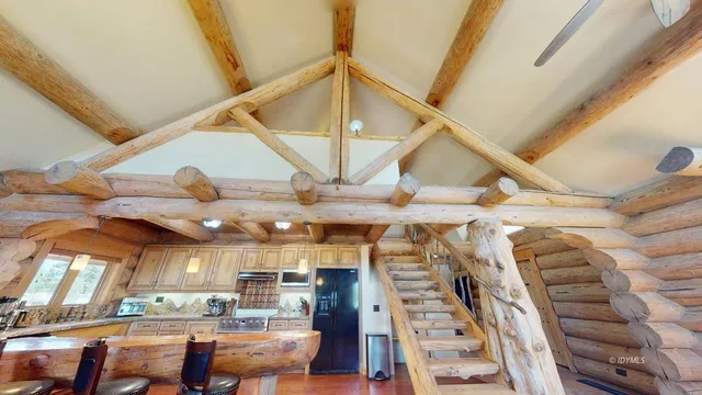 a stove top oven sitting inside of a kitchen