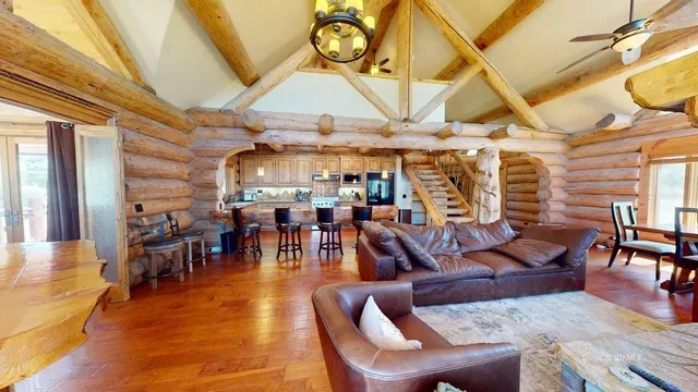 a bedroom with a large bed and a large window