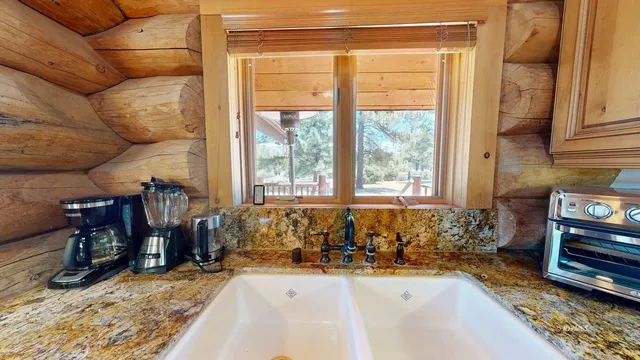 a room with gym equipment and a large window