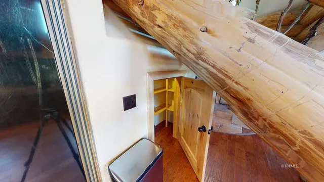 a living room with lots of furniture and a chandelier