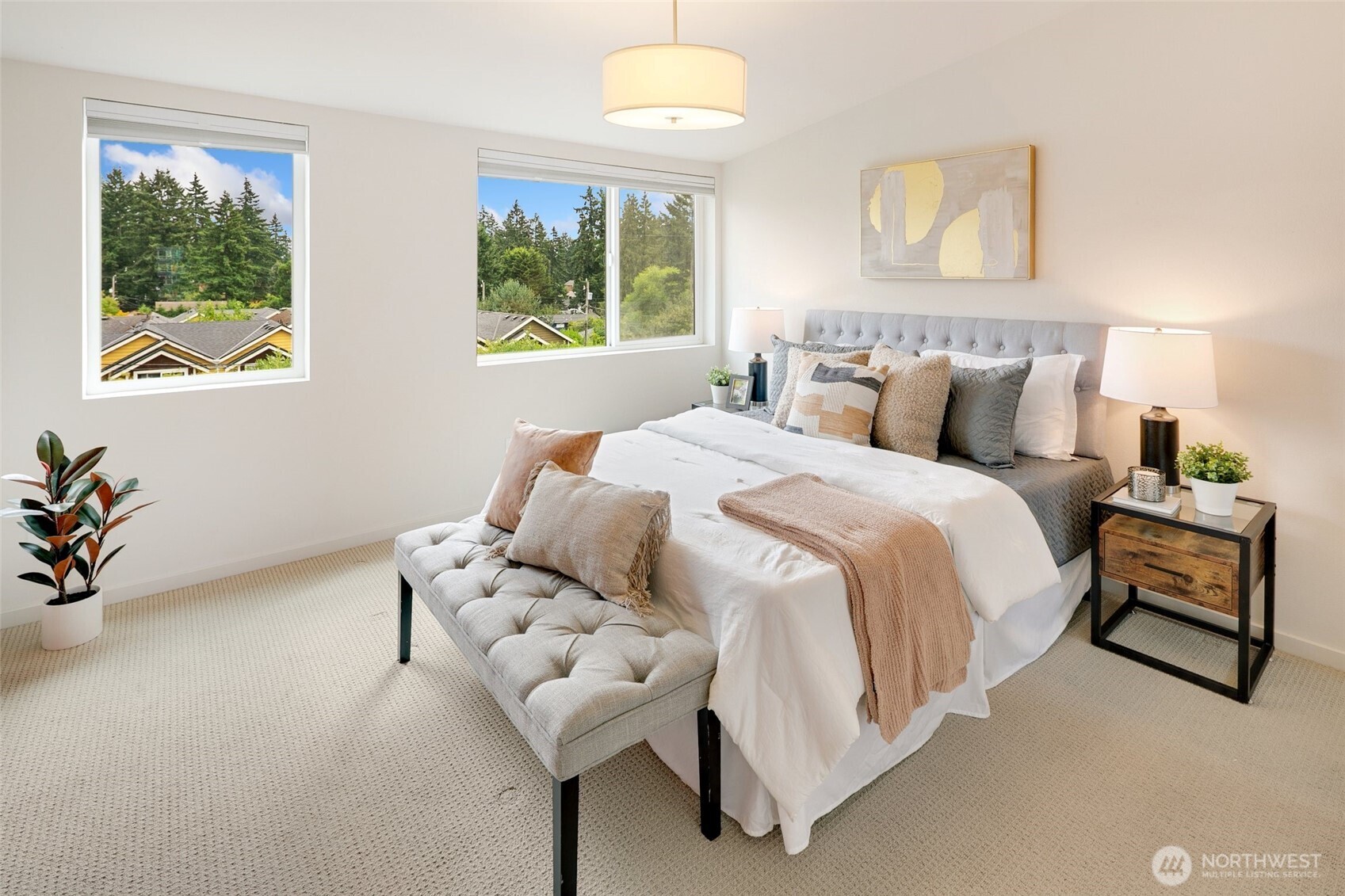 14308 Midvale Avenue North Seattle, WA 98133 - Photo 11 of 29 a bedroom with a bed and a painting on the wall