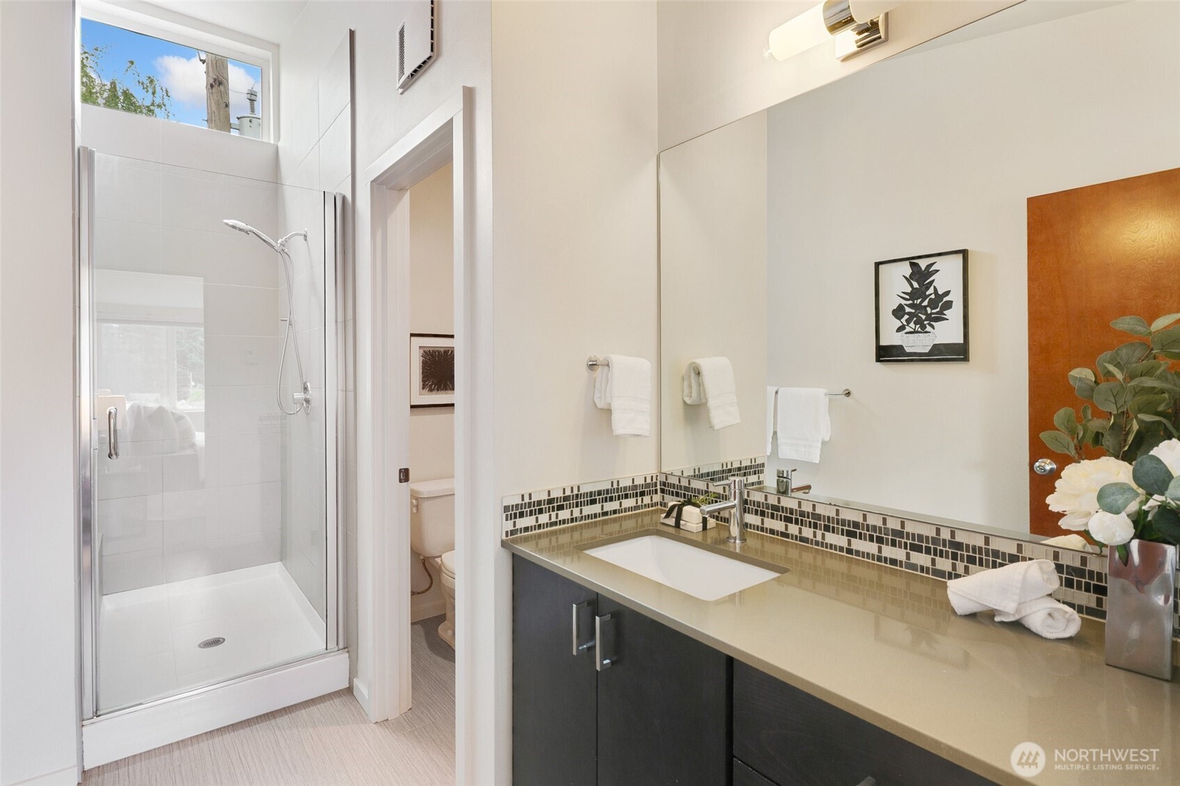 14308 Midvale Avenue North Seattle, WA 98133 - Photo 14 of 29 a bathroom with a sink and a mirror