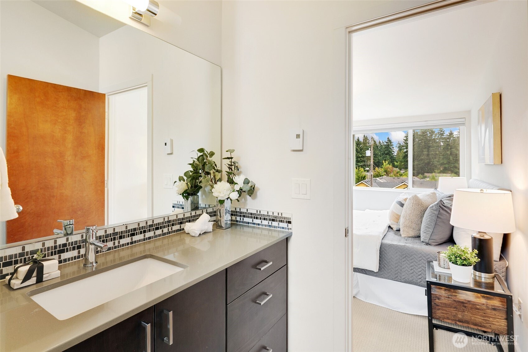 14308 Midvale Avenue North Seattle, WA 98133 - Photo 15 of 29 a bathroom with a granite countertop sink and a mirror