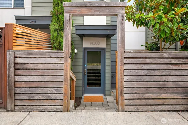 a front view of a house with a garage