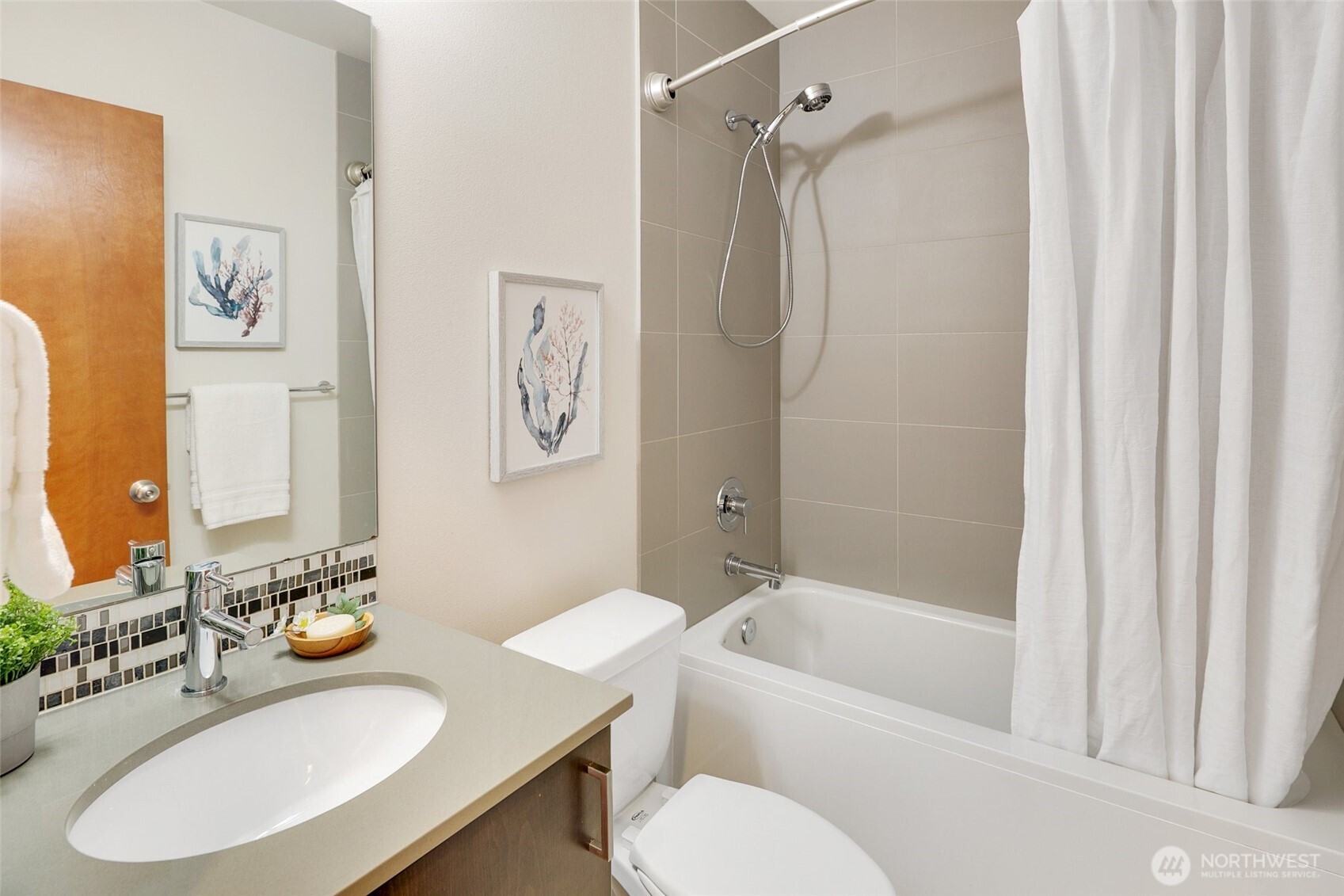 14308 Midvale Avenue North Seattle, WA 98133 - Photo 23 of 29 a bathroom with a sink toilet and shower