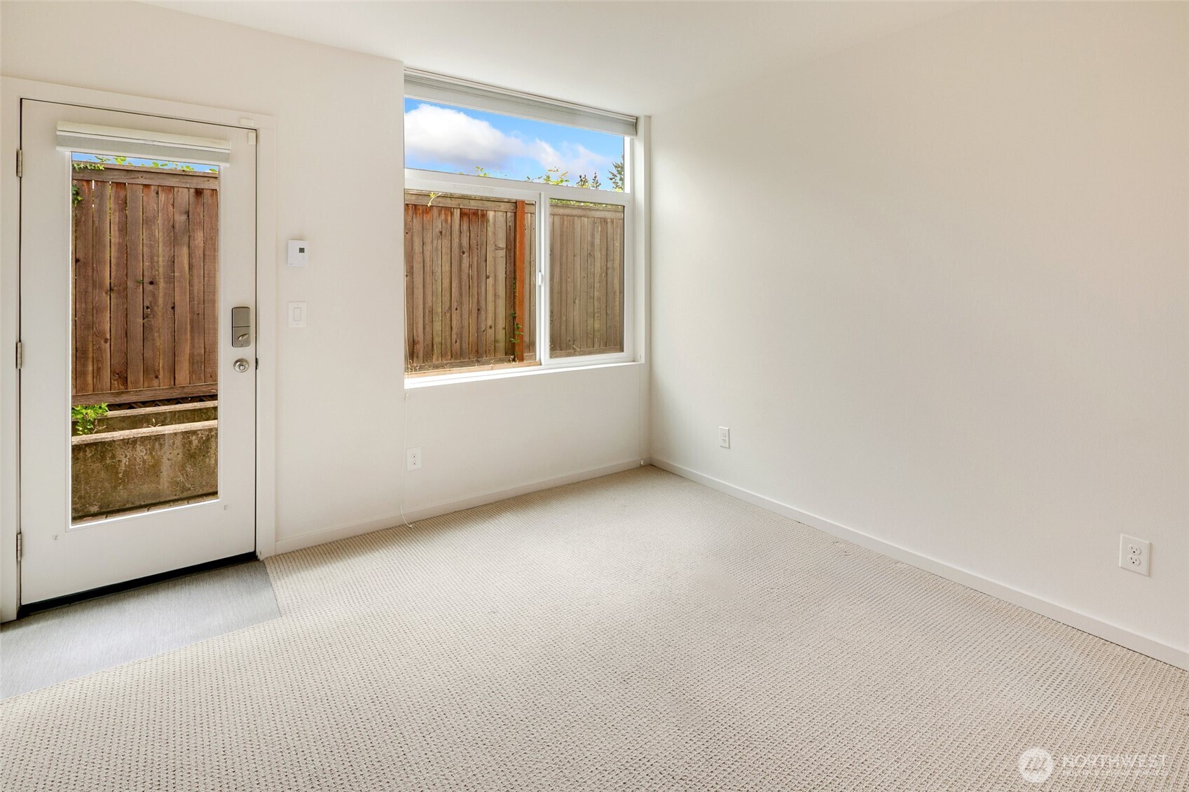 14308 Midvale Avenue North Seattle, WA 98133 - Photo 25 of 29 an empty room with windows