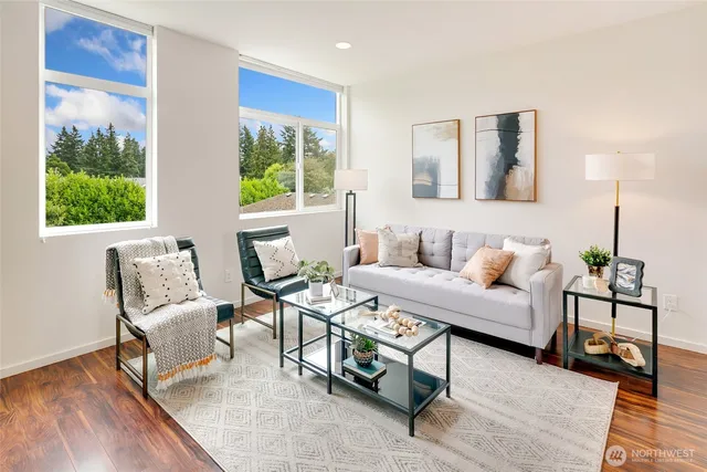 a living room with furniture and a window