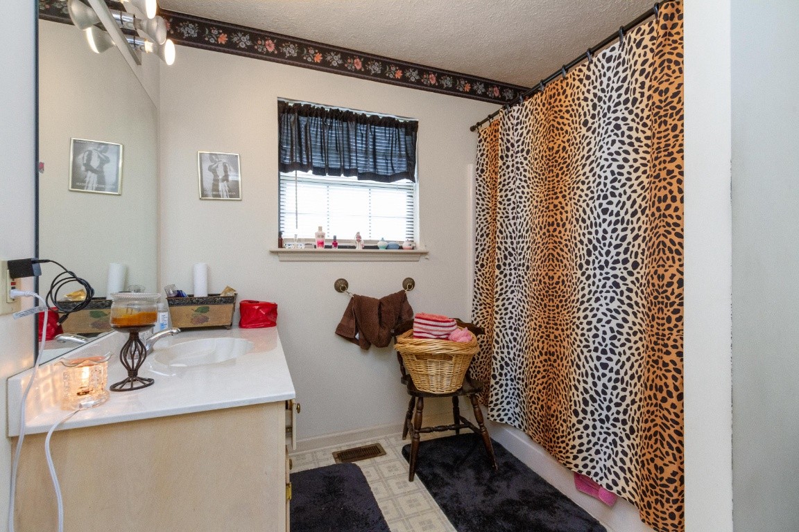 256 Atkinson Road Lebanon, TN 37090 - Photo 25 of 34 a bathroom with a sink toilet and shower