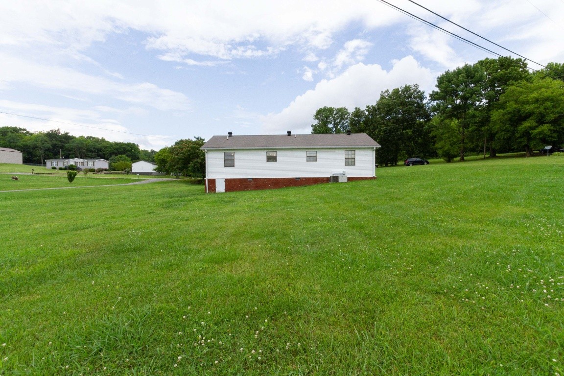 256 Atkinson Road Lebanon, TN 37090 - Photo 34 of 34 a view of a house with a yard