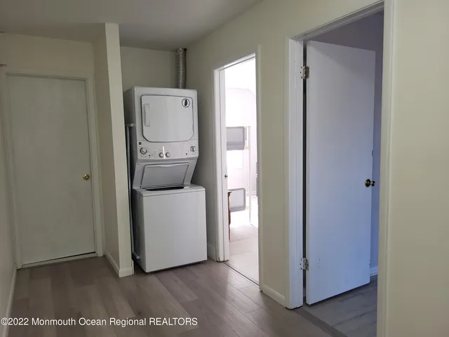 a view of a room with a washer and dryer