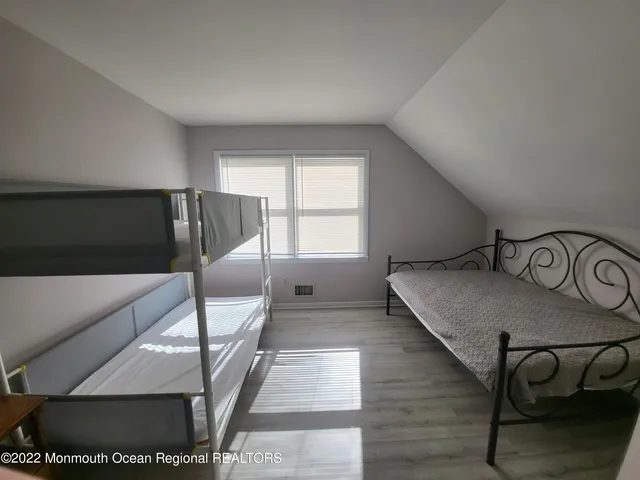 a view of a livingroom with furniture and window