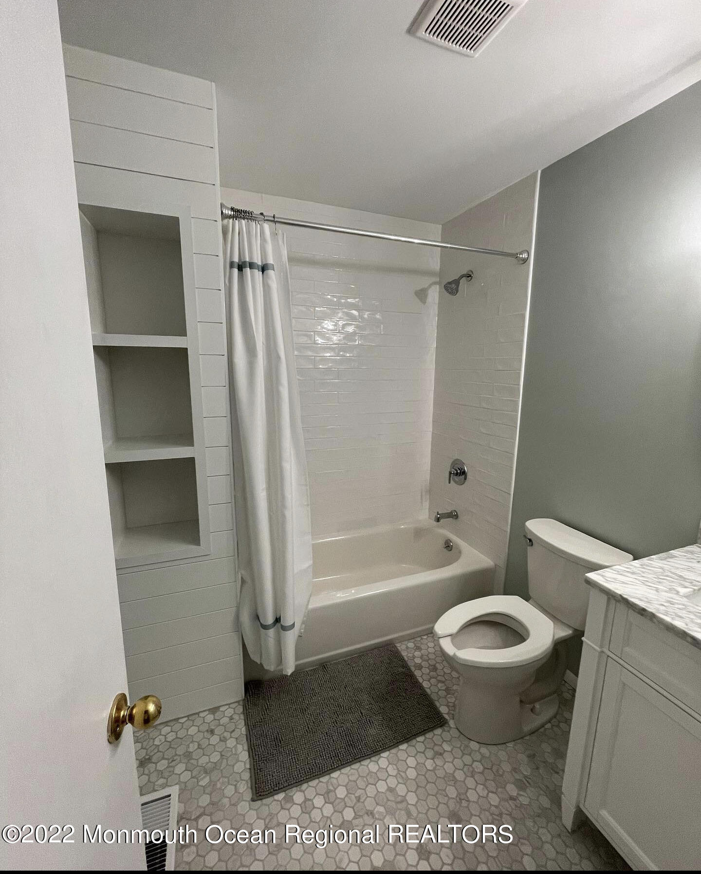 1703 A Street, Unit REAR Belmar, NJ 07719 - Photo 20 of 29 a bathroom with a granite countertop toilet and a shower