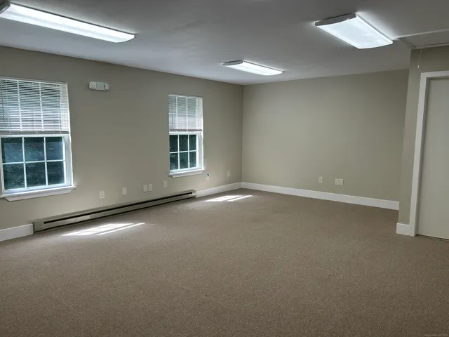 an empty room with windows