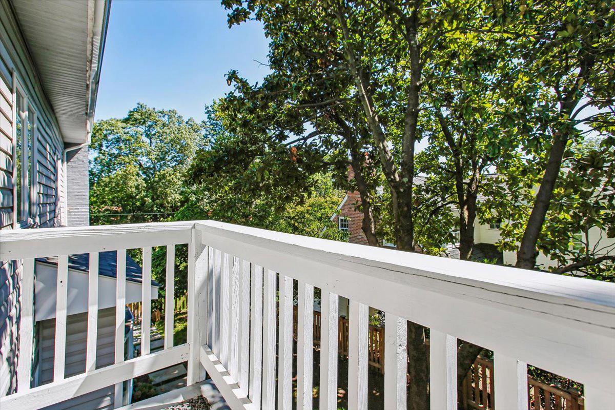 1909 Belfield Road Alexandria, VA 22307 - Photo 52 of 69 Primary bedroom balcony with lush greenery.