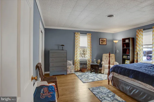 a bedroom with a bed and furniture