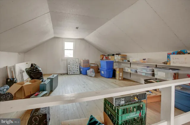 a room with furniture and a wooden floor