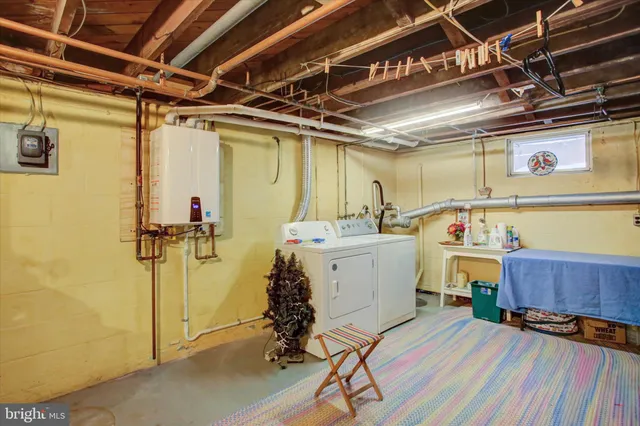 a front view of a house with a large window