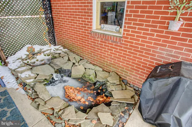 a view of a chairs and table in patio