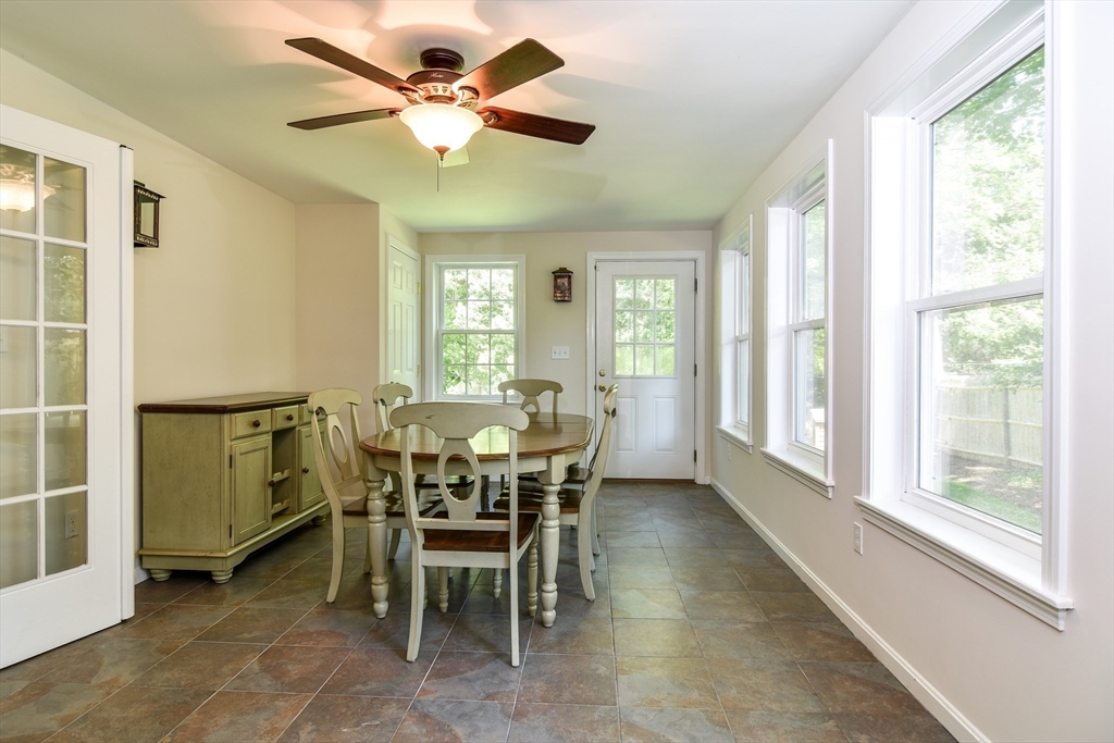 33 Grove Street Framingham, MA 01701 - Photo 8 of 33 a view of a dining room and livingroom with furniture window and outside view