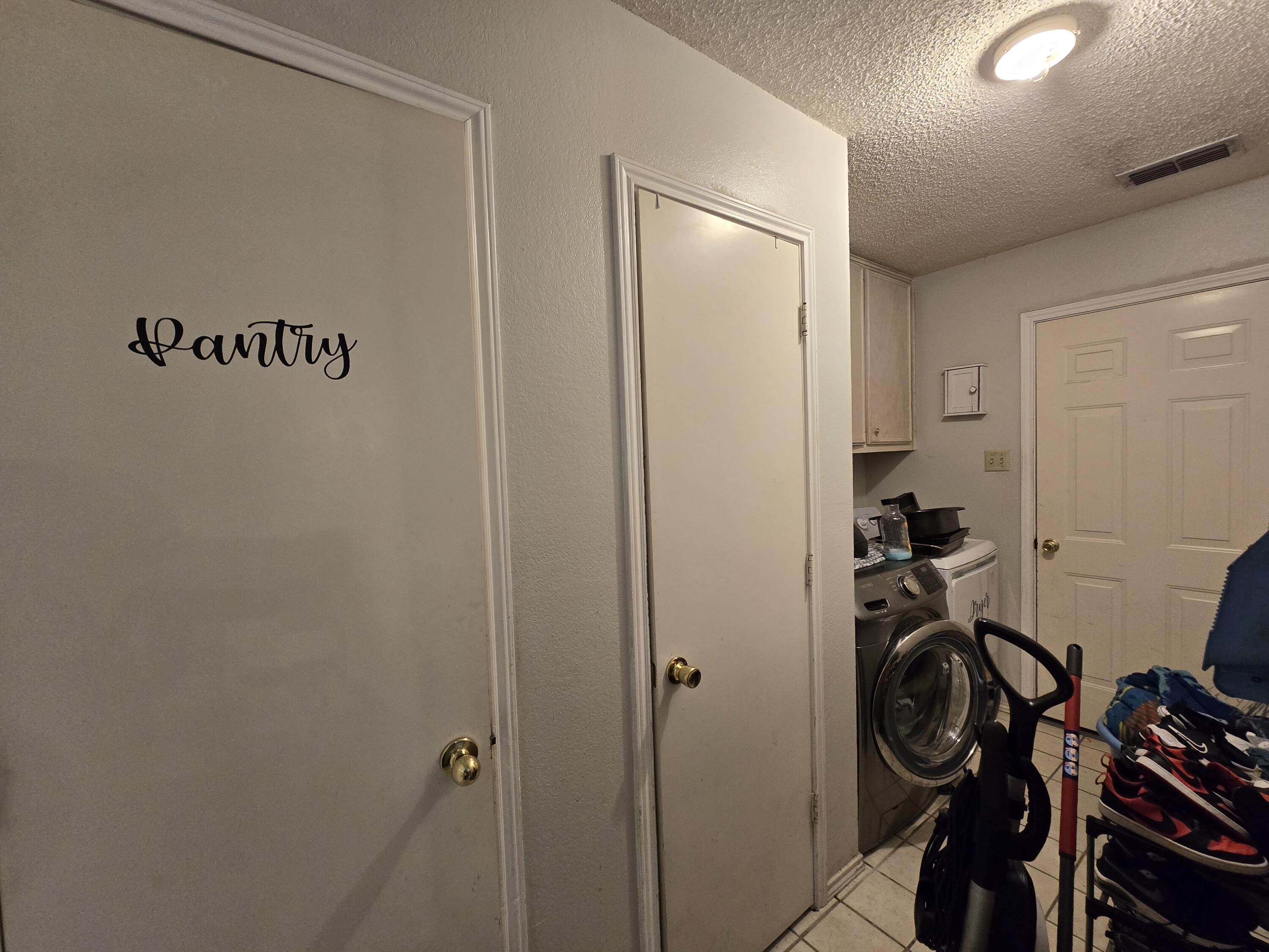 5806 12th Street Lubbock, TX 79416 - Photo 7 of 17 a view of a storage & utility room
